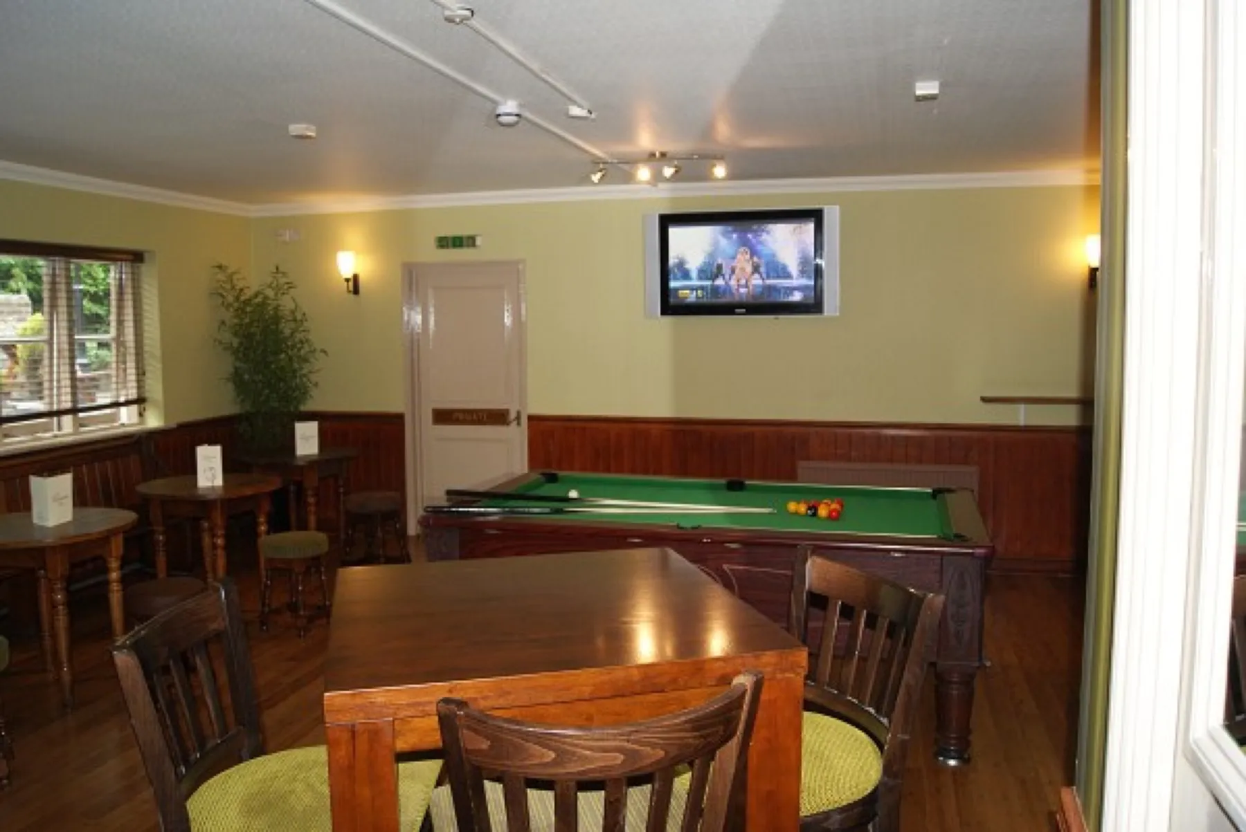 The public bar and games room with pool table