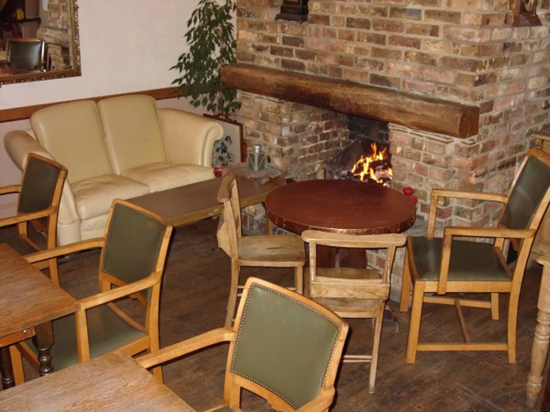 The front lounge with its fireplace and comfortable seating